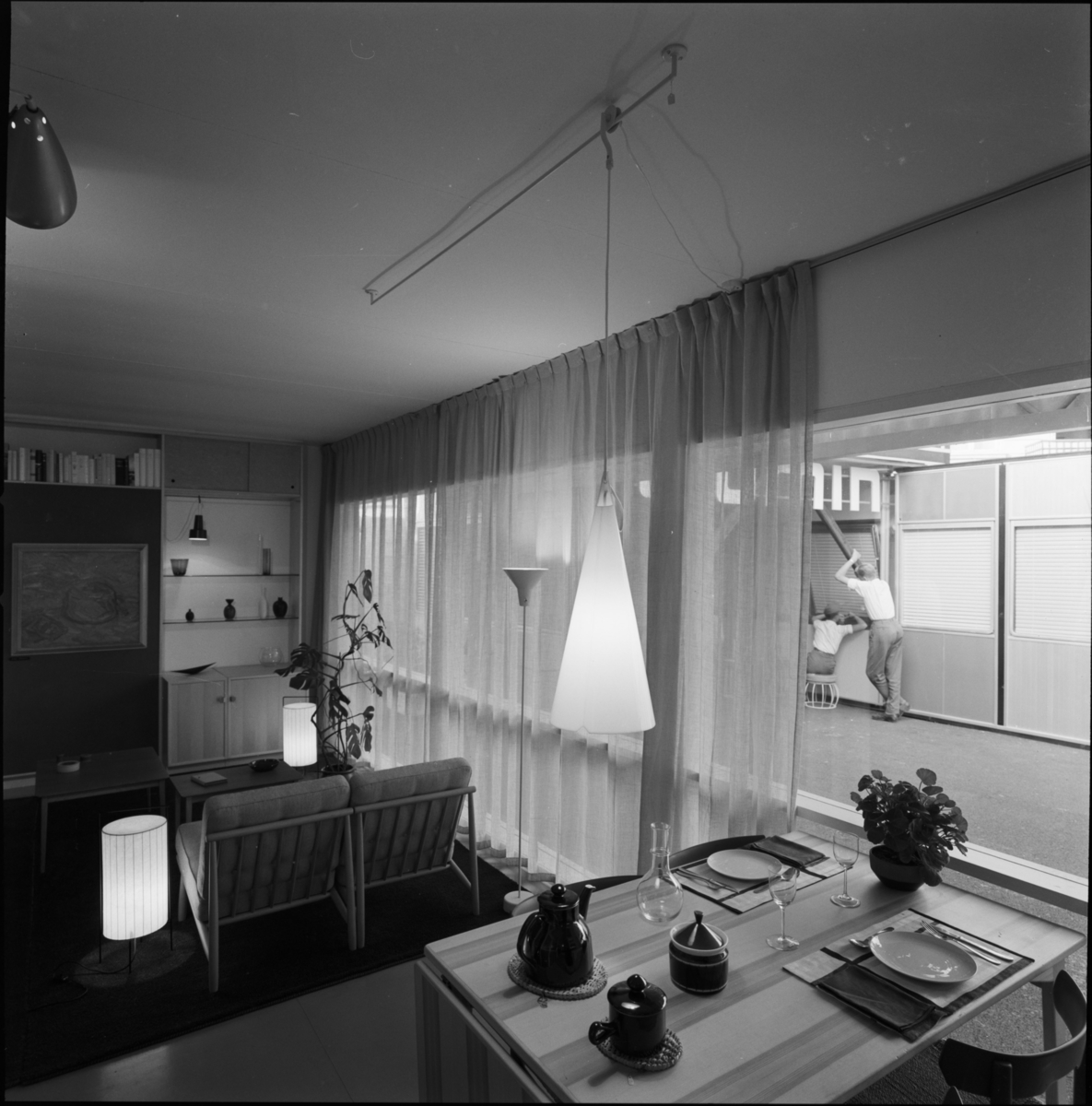 Interior with Ateljé Lyktan lamps at the H55 exhibition, Helsingborg, 1955